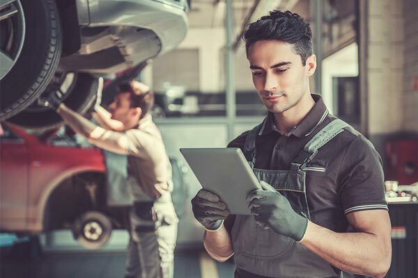 Featured image for A Look Under the Hood: How Software Helps Improve Efficiency and Maximize Daily Profits for Auto Repair Shops post